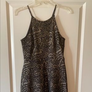 Black and gold patterned cocktail dress